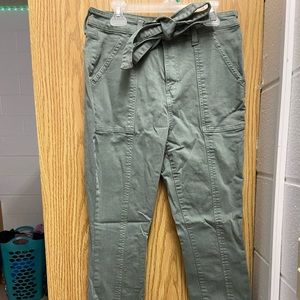 Green jeans with a belt attached, never worn